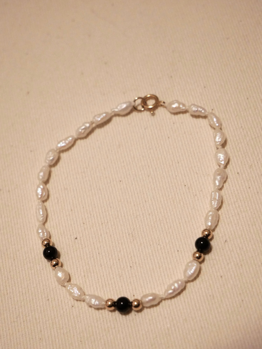 Rice Pearl & Black Bead Bracelet