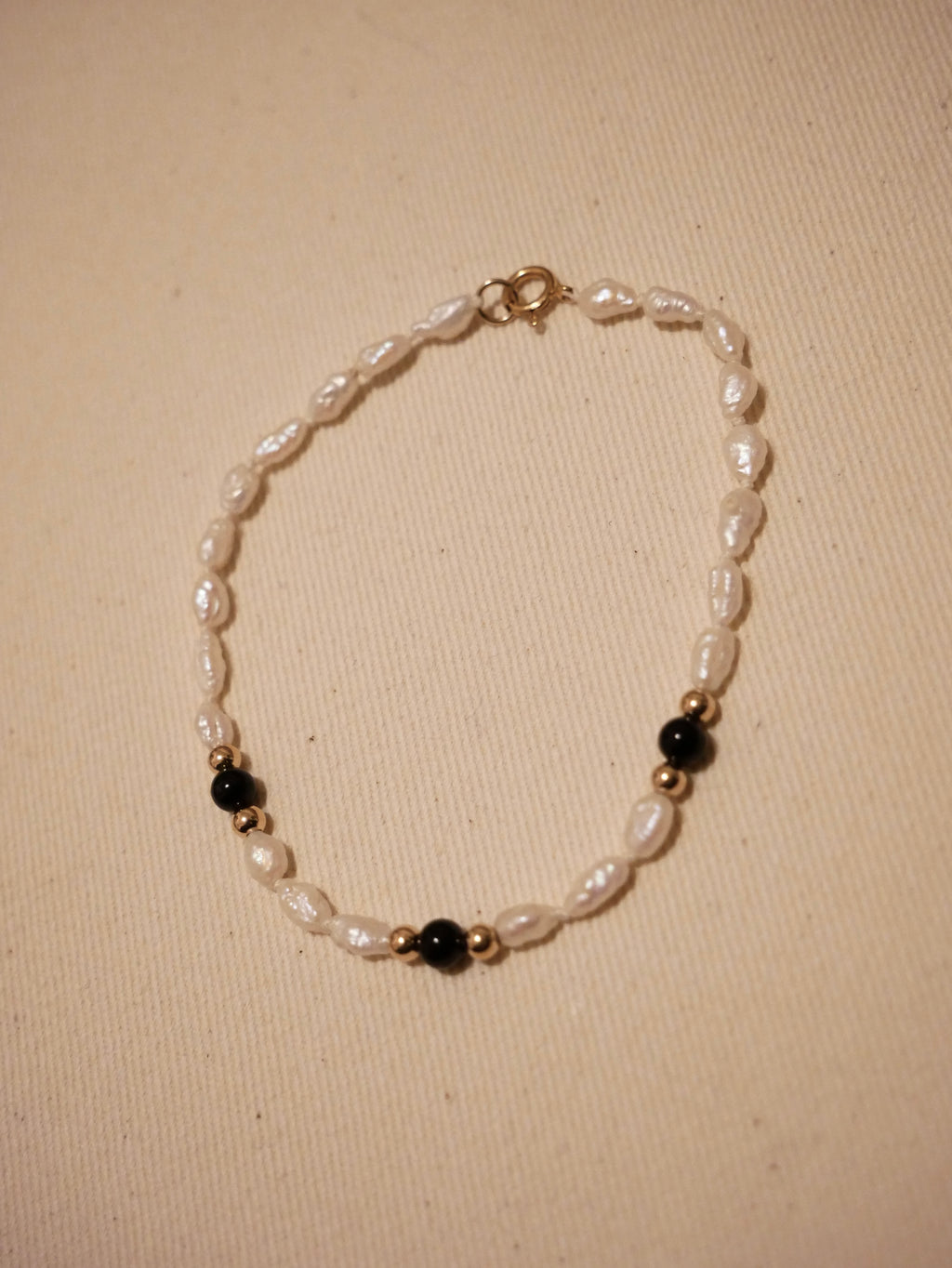 Rice Pearl & Black Bead Bracelet